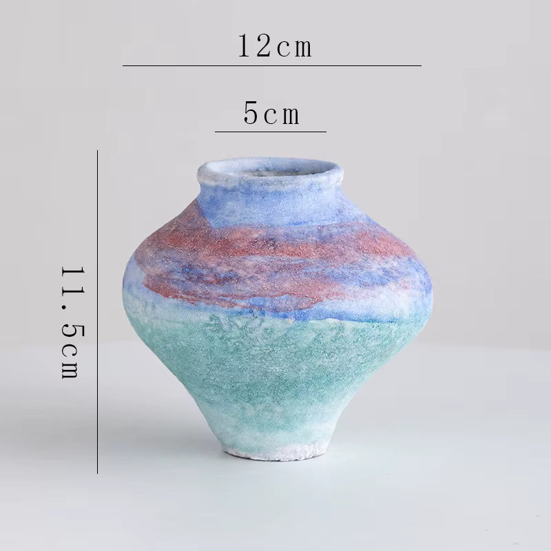 Ceramic vase with gradient color design and measurements on a light gray background