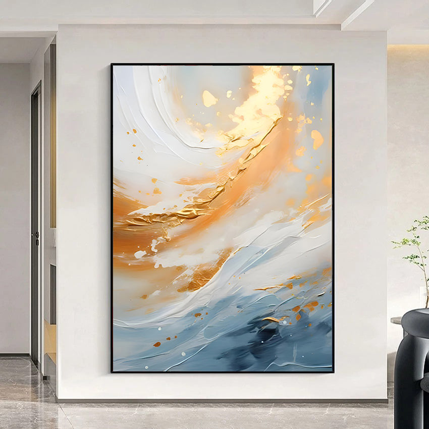 Abstract art painting with gold and blue tones in a modern interior setting