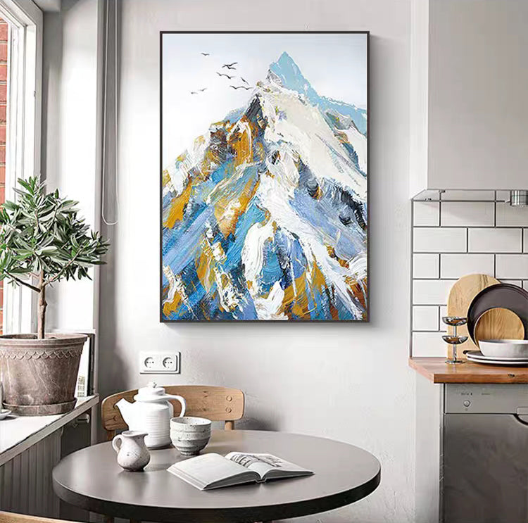 Abstract mountain painting in a modern kitchen setting