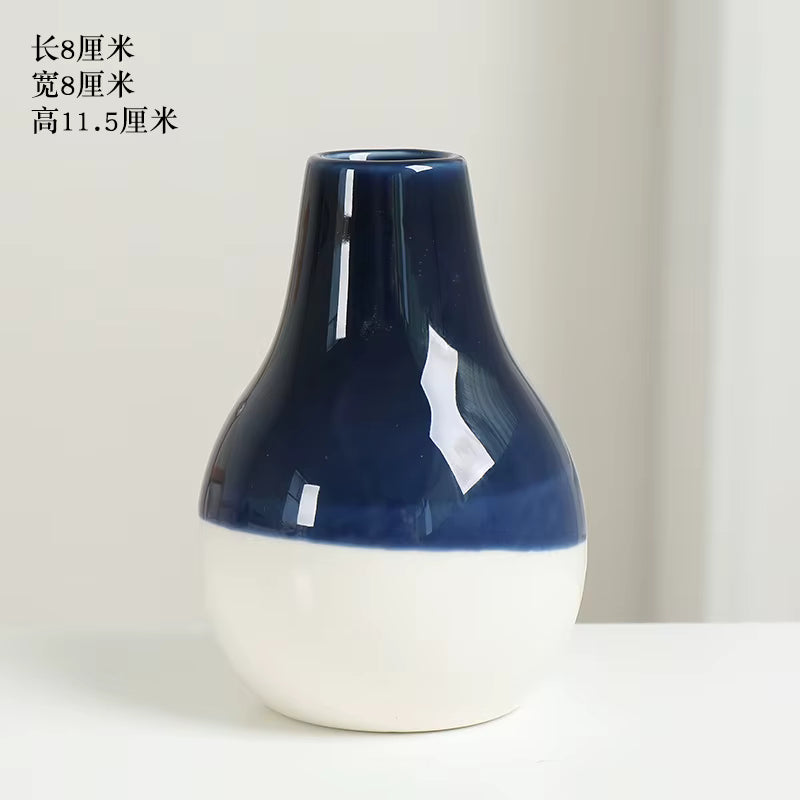 Blue and white ceramic vase on a light background