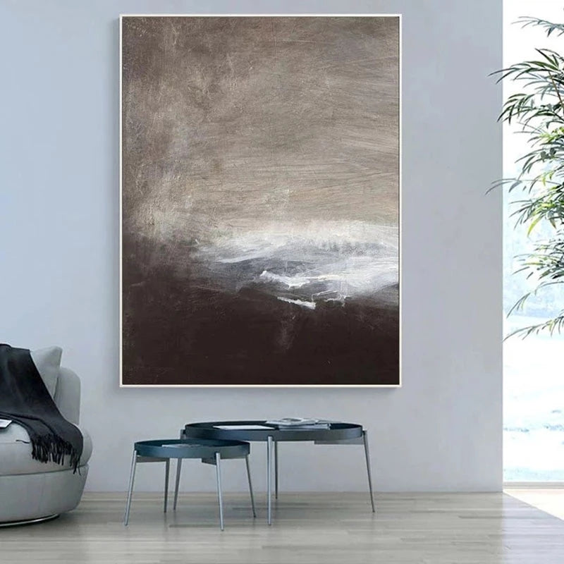 Abstract painting in a modern living room with a sofa and coffee table.