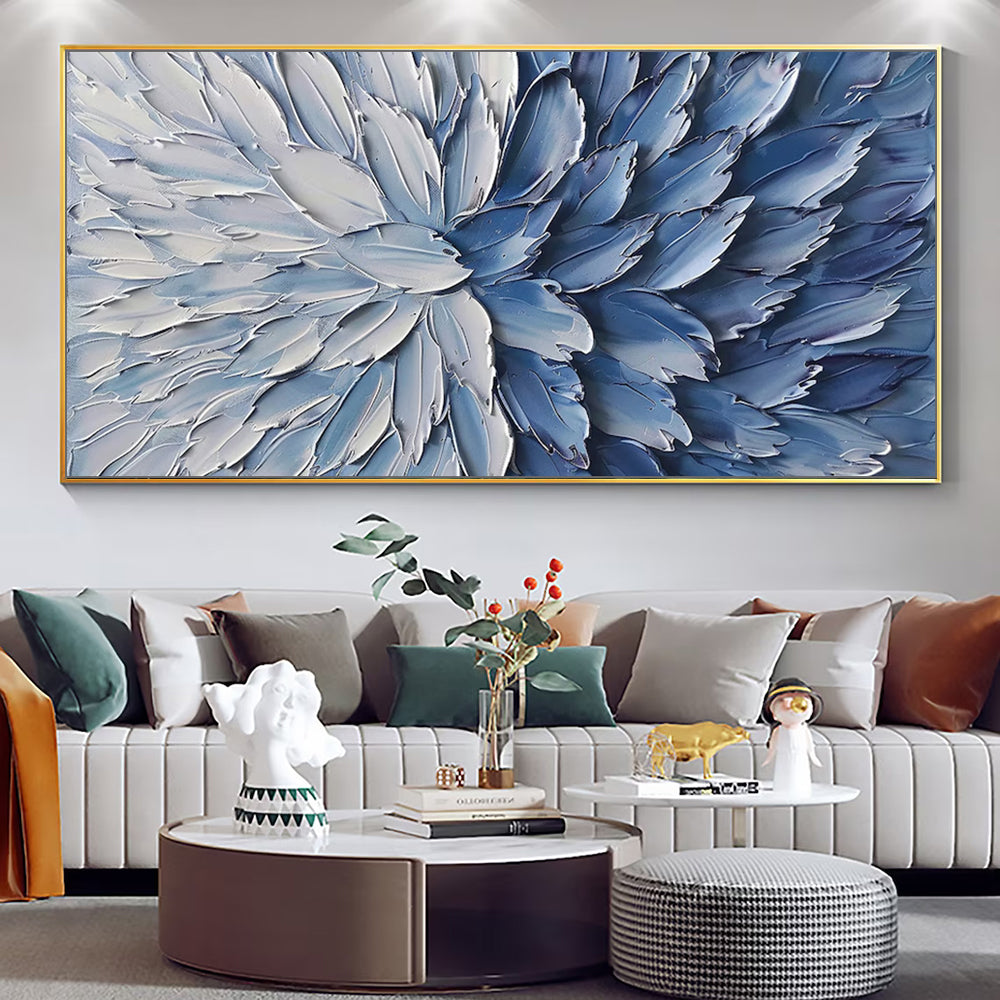 Living room with a large abstract blue floral painting on the wall.