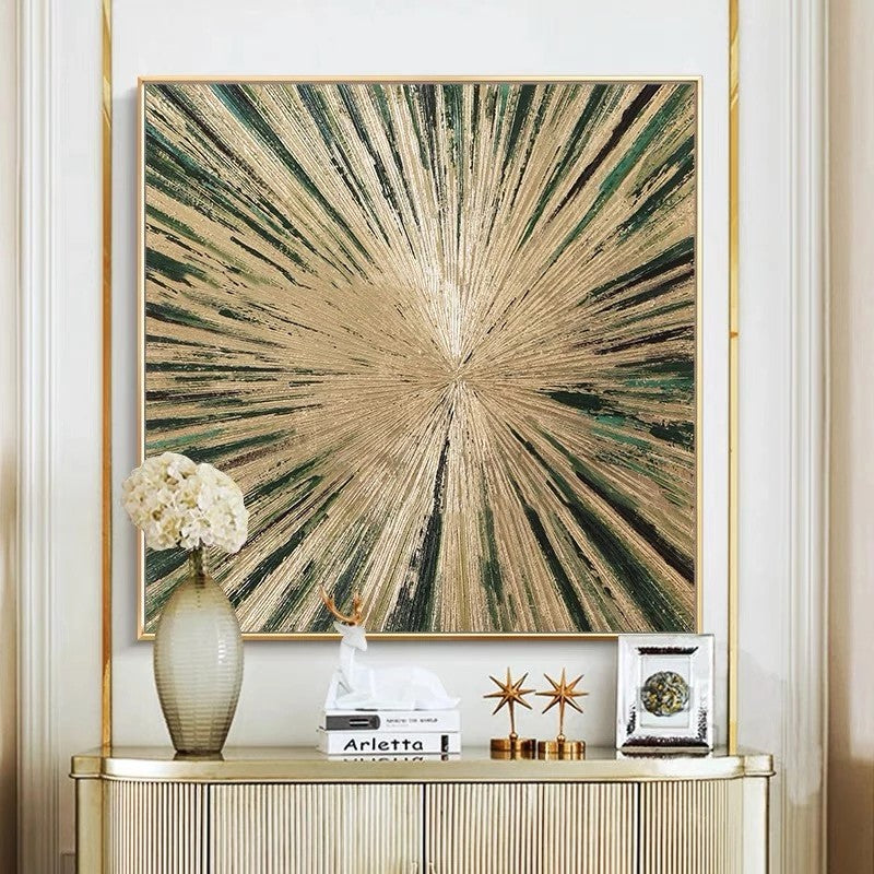 Abstract art piece with放射性图案 on a wall above a console table with decorative items.