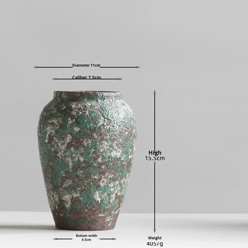 Decorative vase with measurements on a gray background