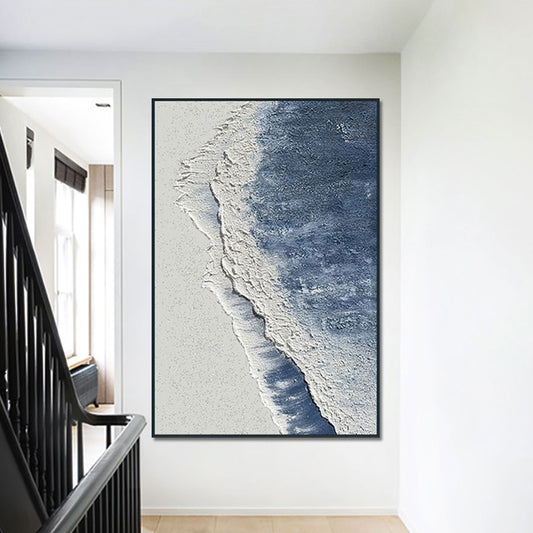 Framed abstract artwork on a wall in a modern interior setting