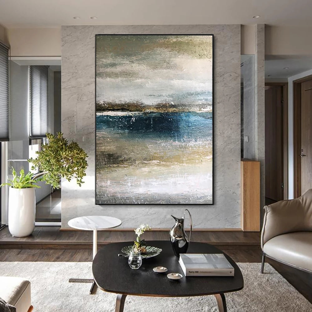 Modern living room with abstract painting on the wall, coffee table, and decorative items.
