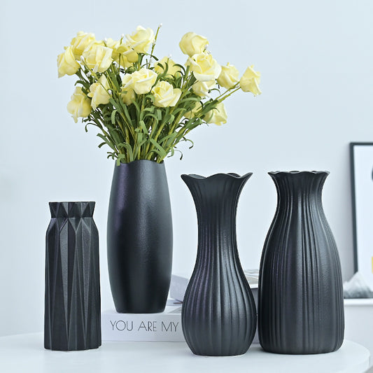 Set of black vases with yellow flowers on a light blue background