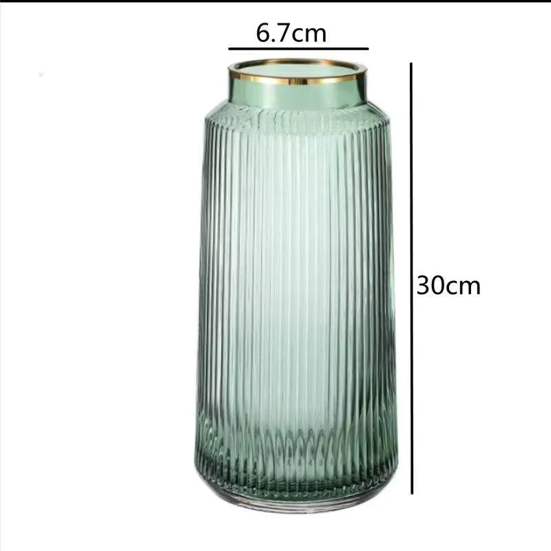 Green ribbed vase with gold rim and measurements on a white background