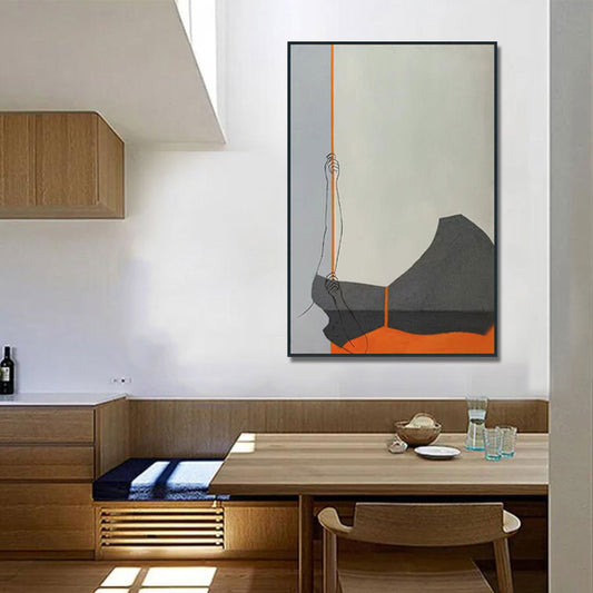 Modern interior with a dining table and abstract art on the wall