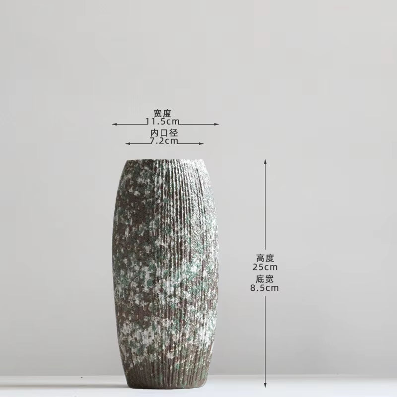 Ceramic vase with dimensions labeled on a white background