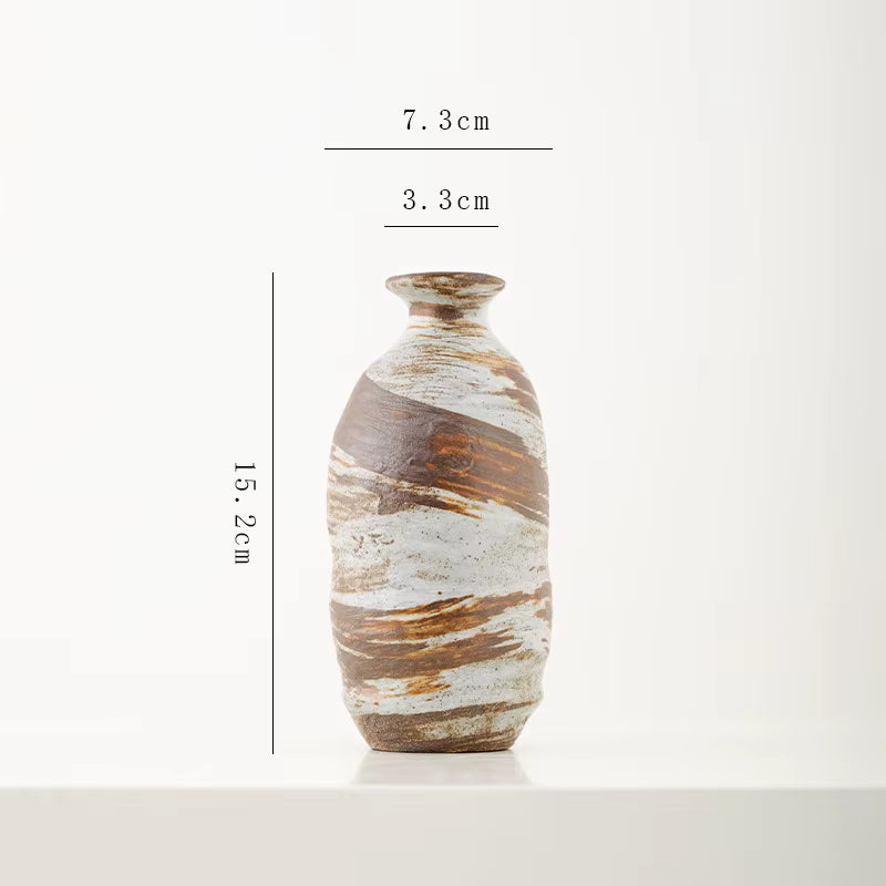 Ceramic vase with dimensions labeled on a white background