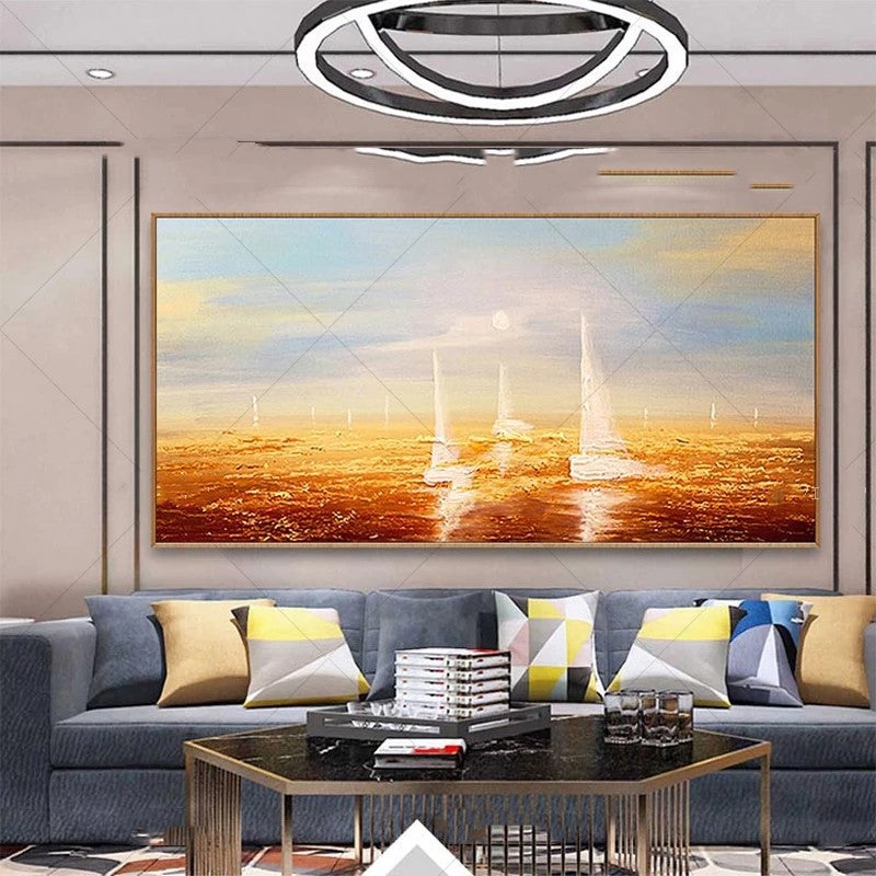 Living room with a large abstract painting of a sunset over water, gray sofa with colorful pillows, and a coffee table.