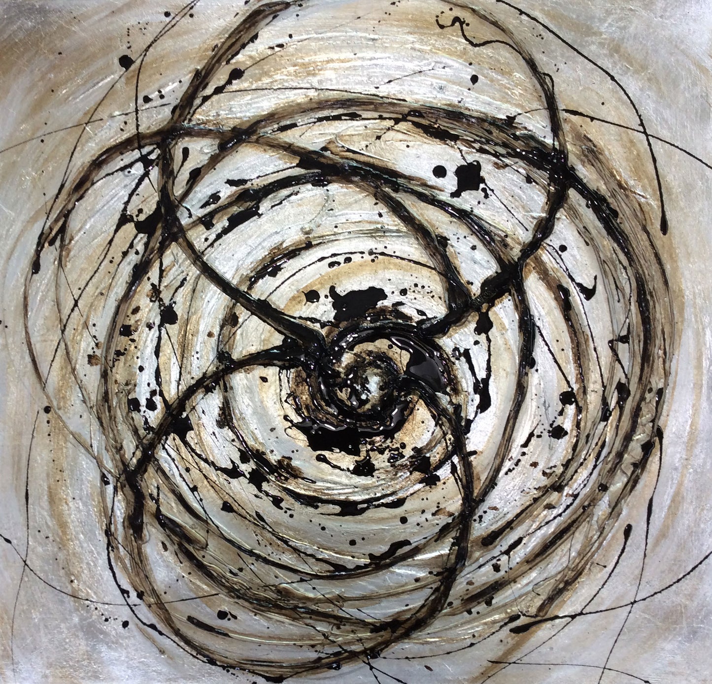 Abstract art with swirling black lines on a beige background