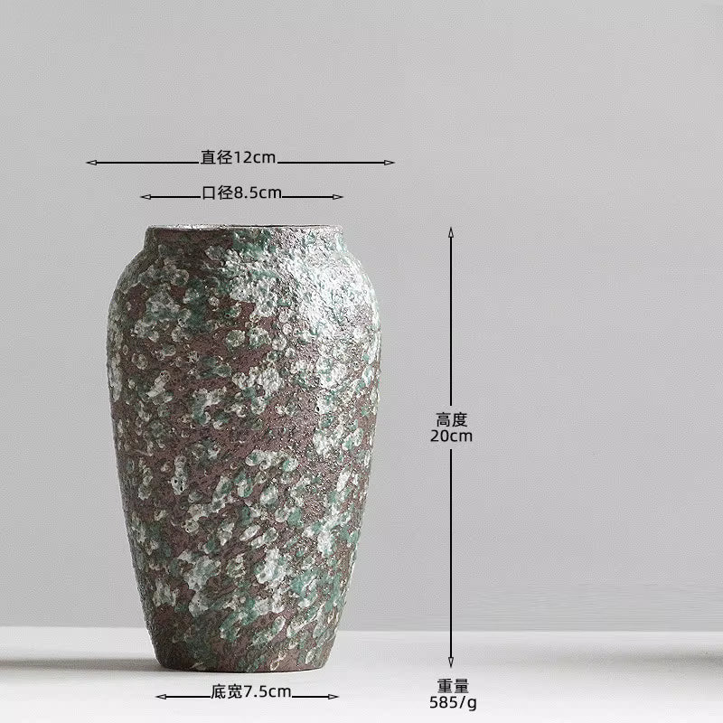 Decorative vase with measurements on a gray background