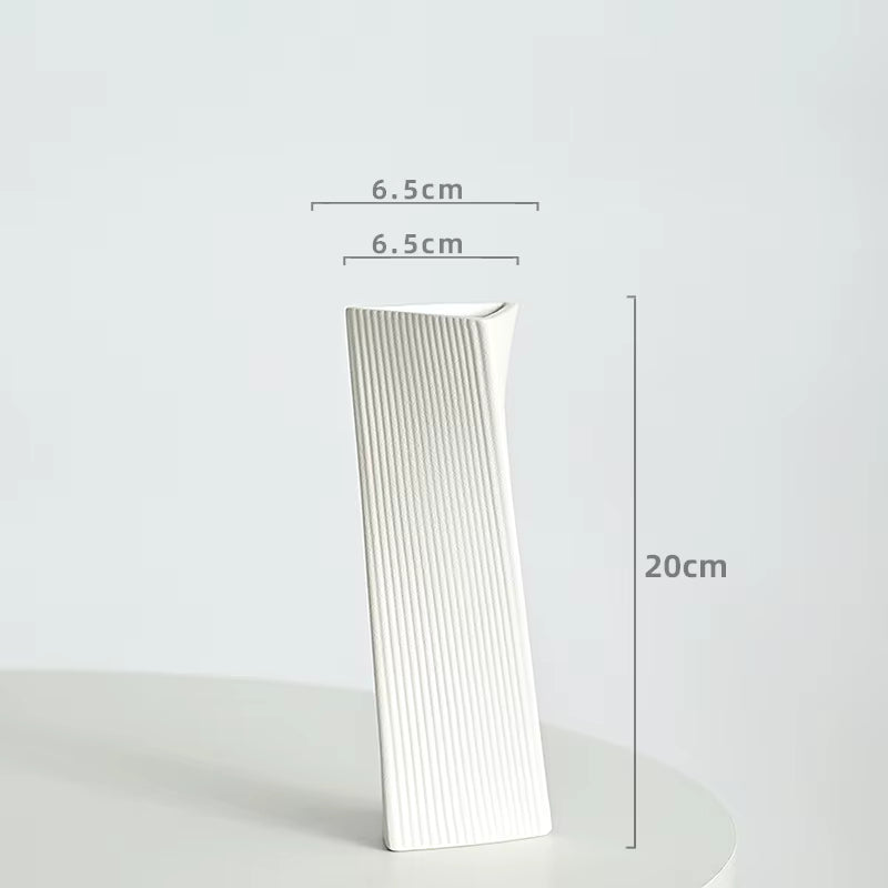 Rectangular white vase with measurements on a light gray background