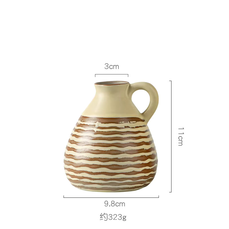Ceramic pitcher with wavy design and measurements on a white background