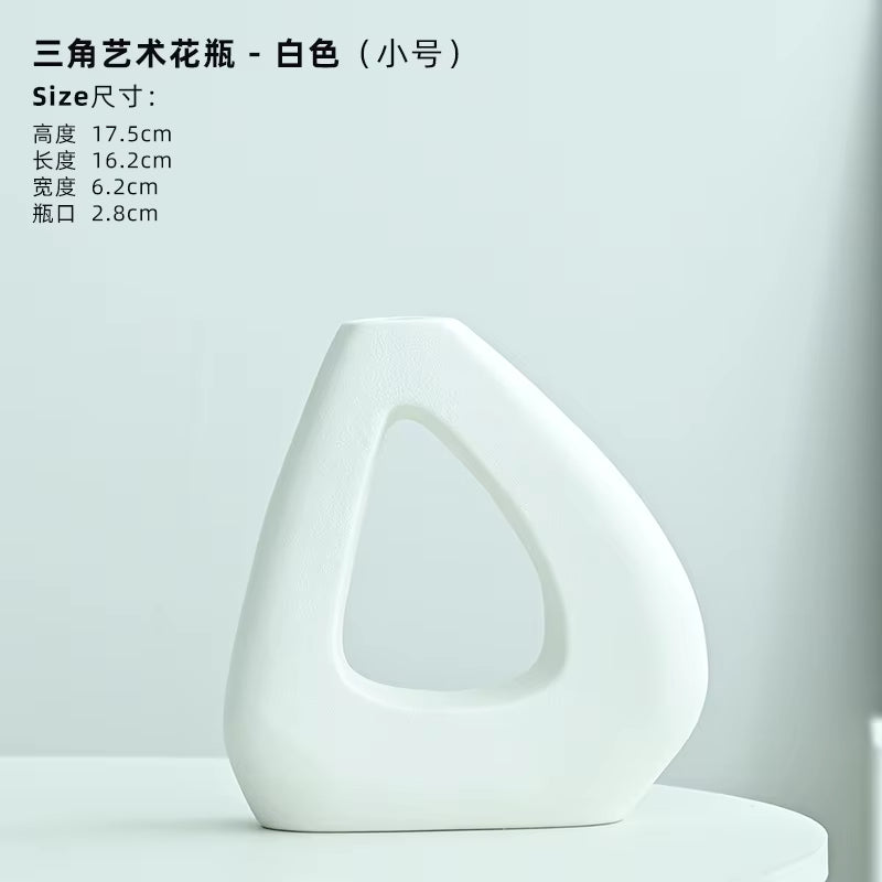 White ceramic vase on a light gray background with product dimensions displayed.