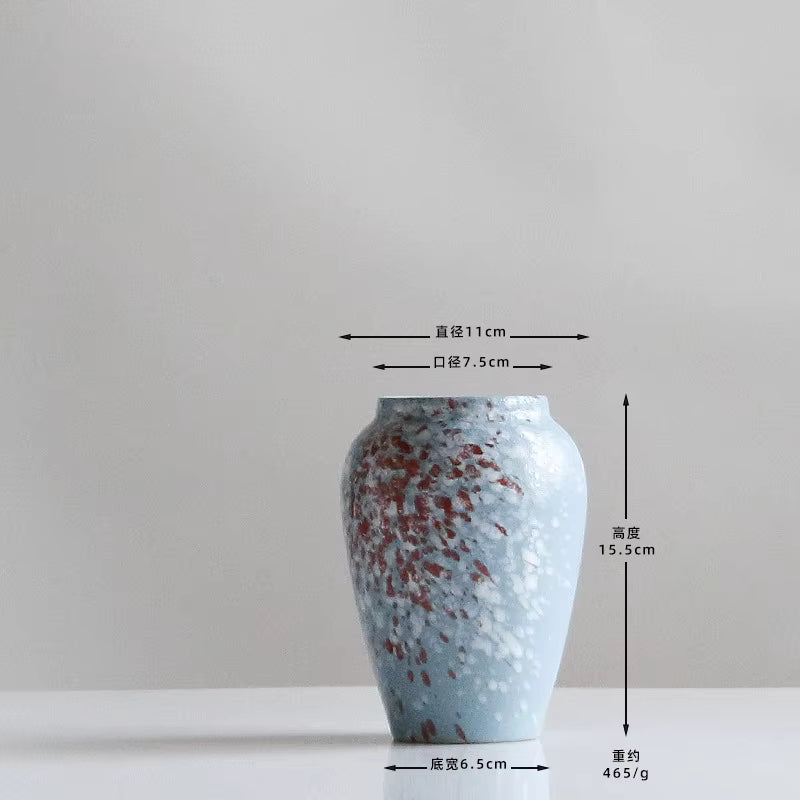 Ceramic vase with measurement indicators on a gray background