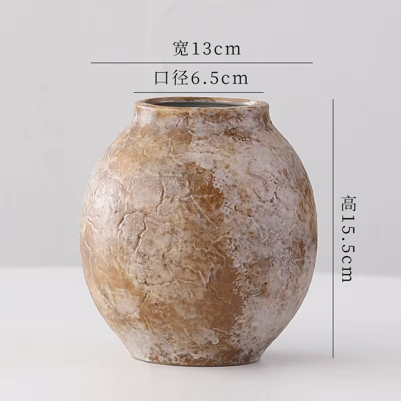 Brown ceramic vase with measurements on a light gray background