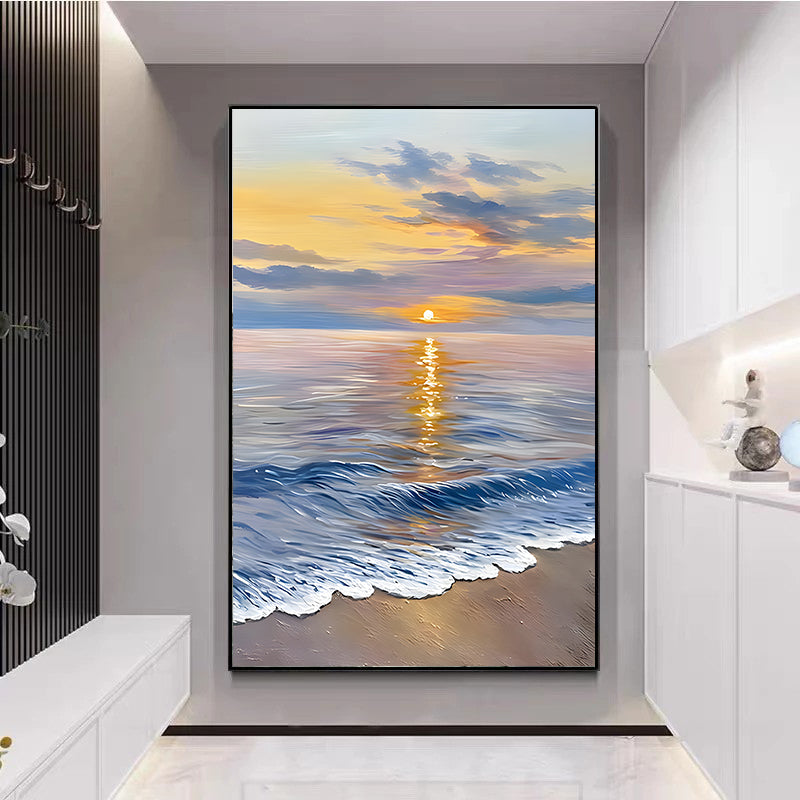 Framed artwork of a sunset over water in a modern interior setting.