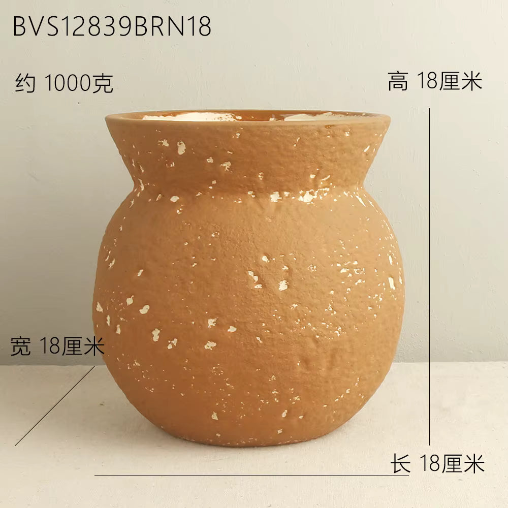 Brown ceramic pot with measurements on a light gray background