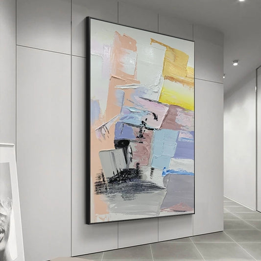 Abstract art piece on a wall in a modern interior setting