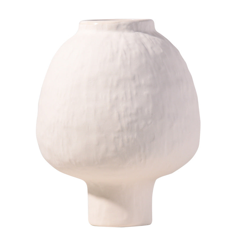 White ceramic vase on a white background