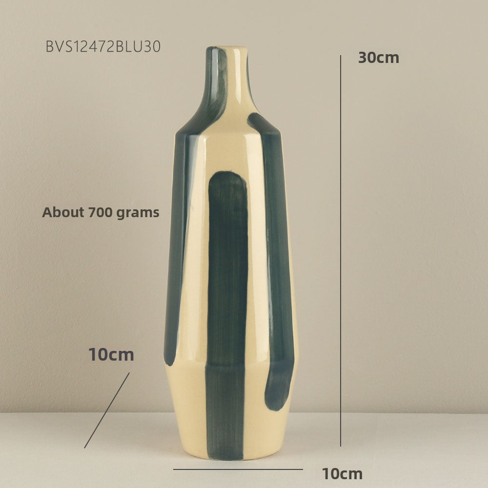 Beige and green vase with measurements on a beige background