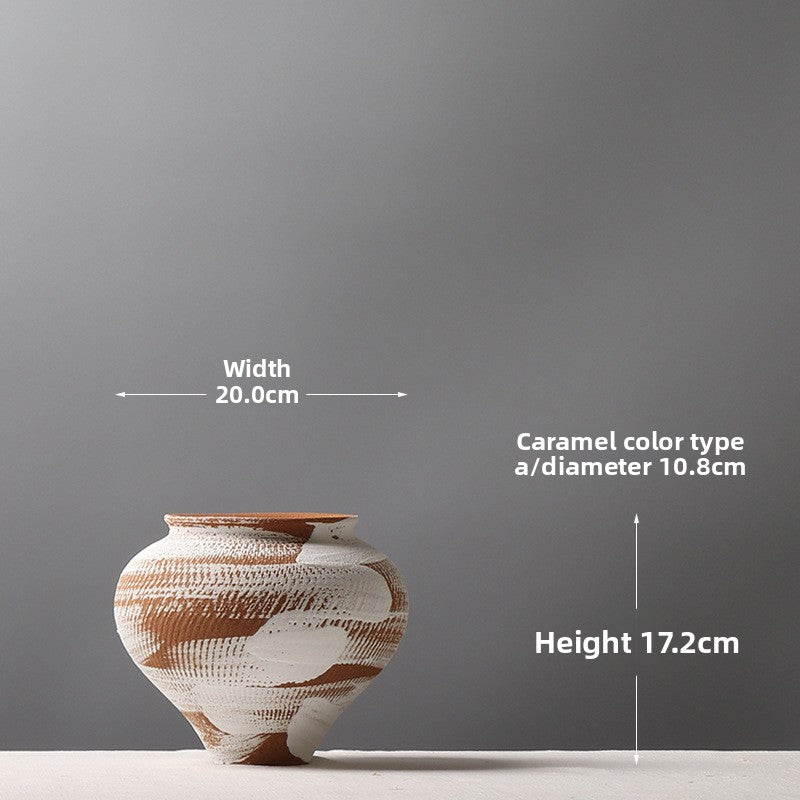 Ceramic vase with measurements on a gray background