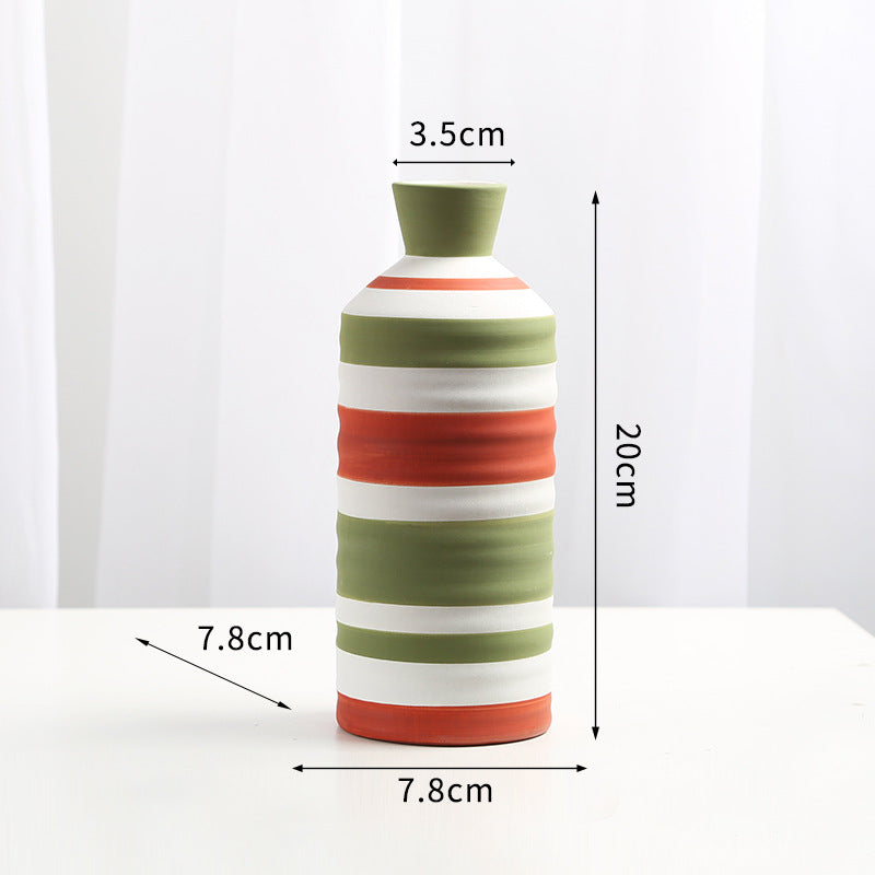 Striped vase with measurements on a white background