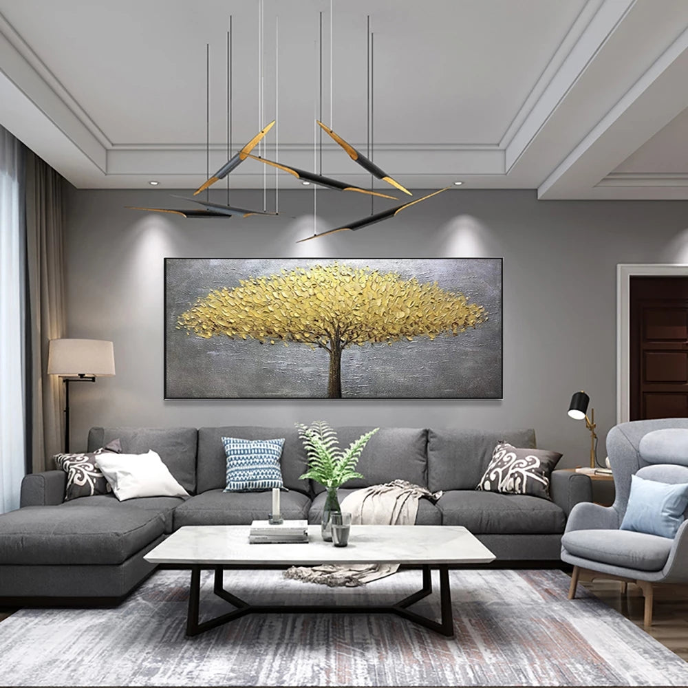 Modern living room with gray sofa, coffee table, and decorative wall art.