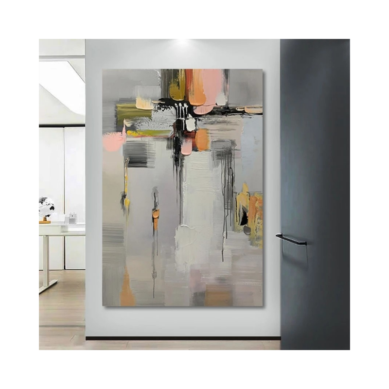 Abstract art piece with colorful shapes on a white wall.