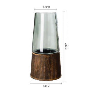 Tall glass candle holder with wooden base and dimensions on a white background