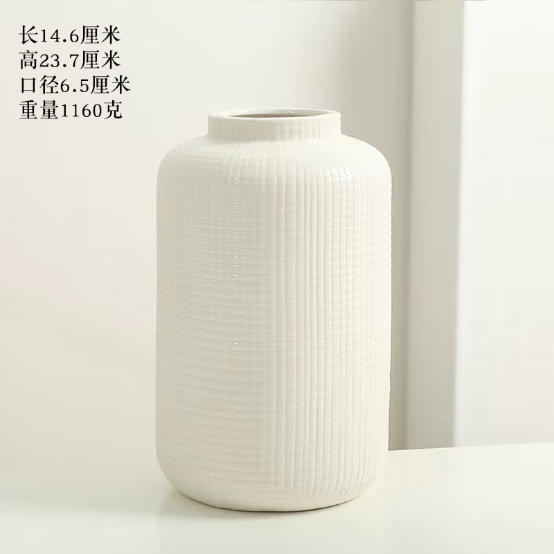 White textured vase on a light background