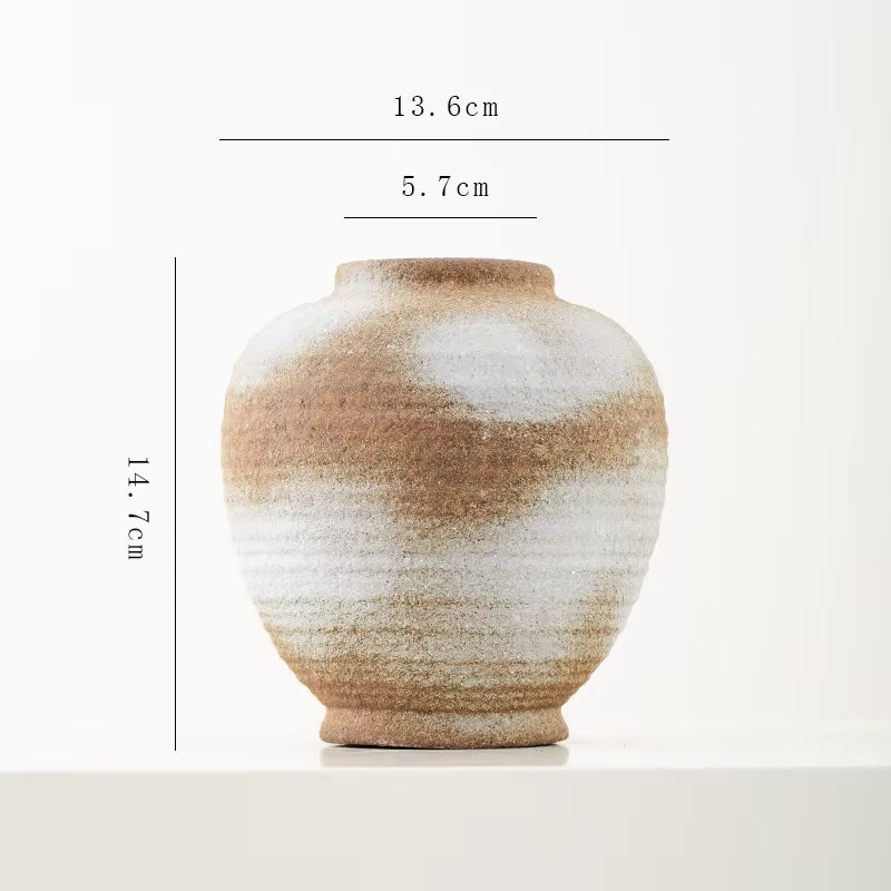 Ceramic vase with gradient design and measurements on a white background