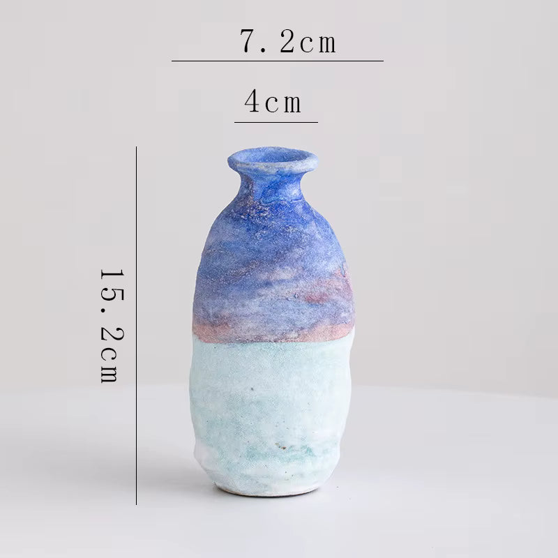 Ceramic vase with measurements on a light gray background