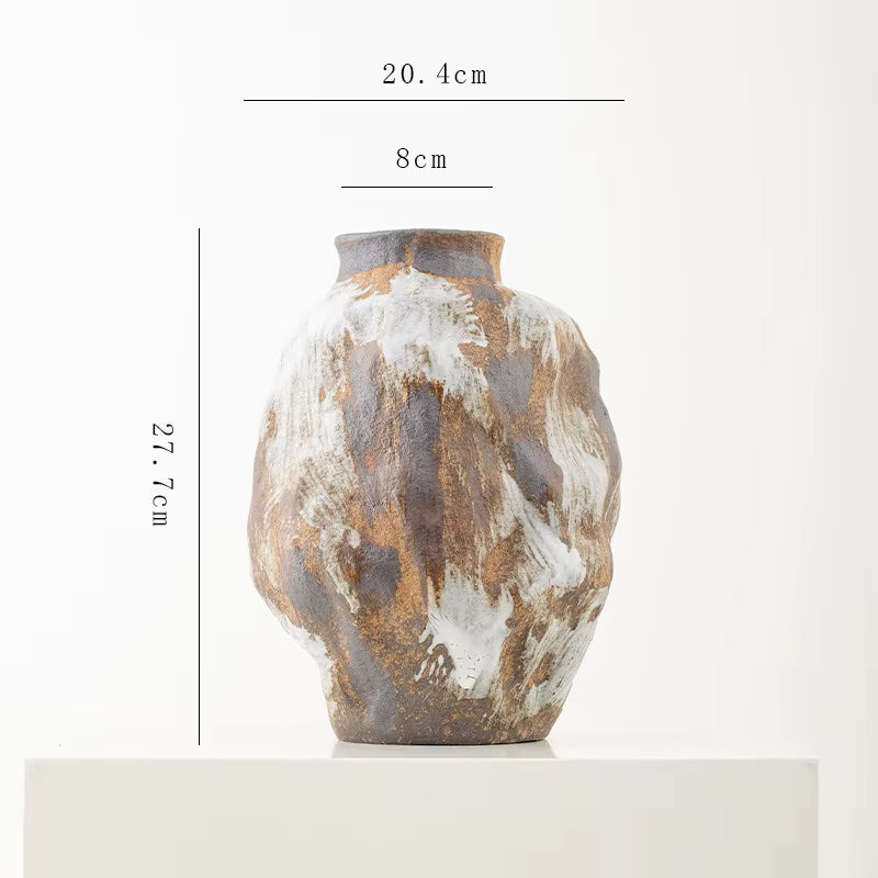 Ceramic vase with measurement details on a white background