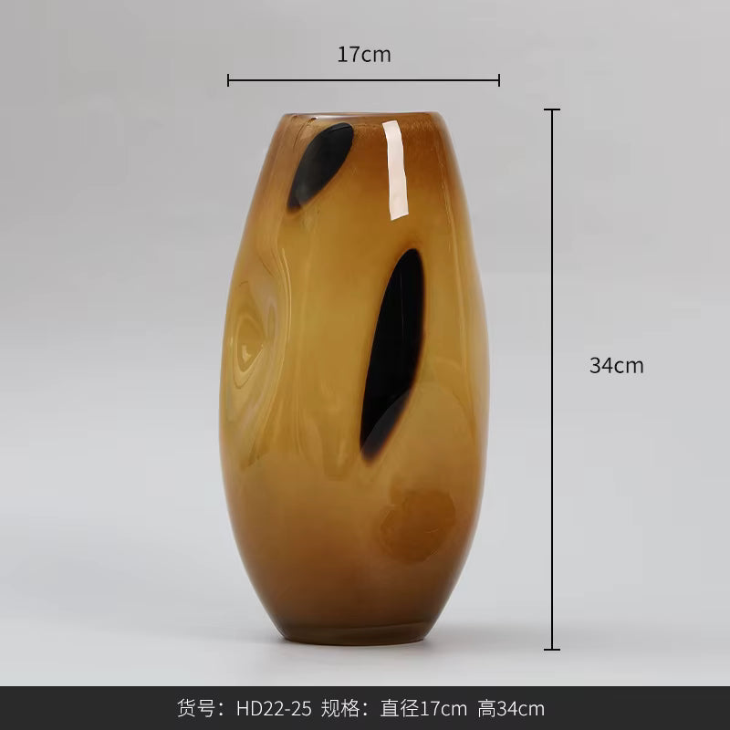 Wooden-textured vase with black leaf designs and measurements on a gray background