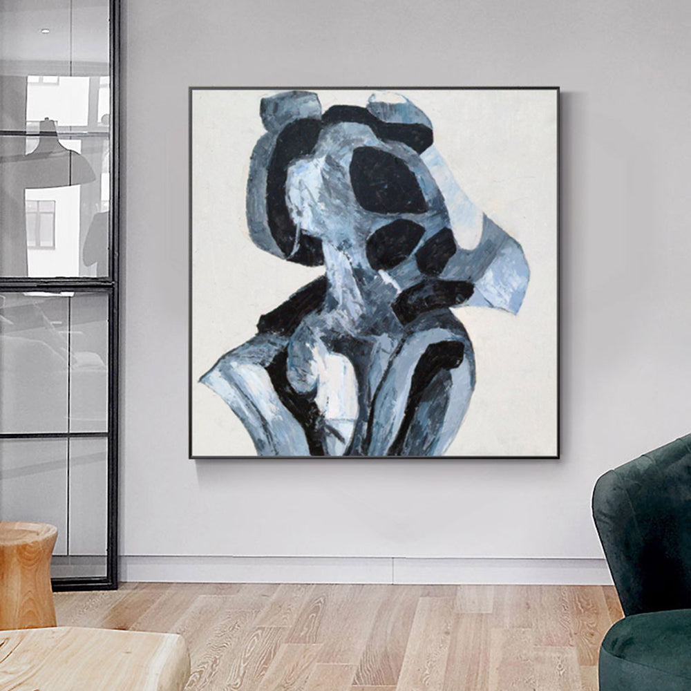 Abstract art piece in a modern living room setting
