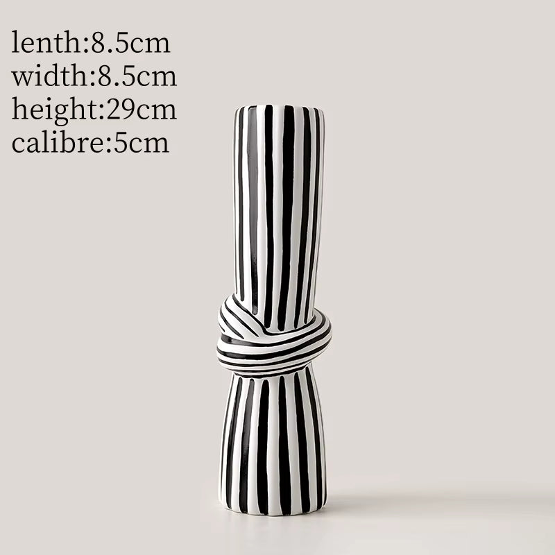 Black and white striped vase on a light gray background with dimensions displayed.