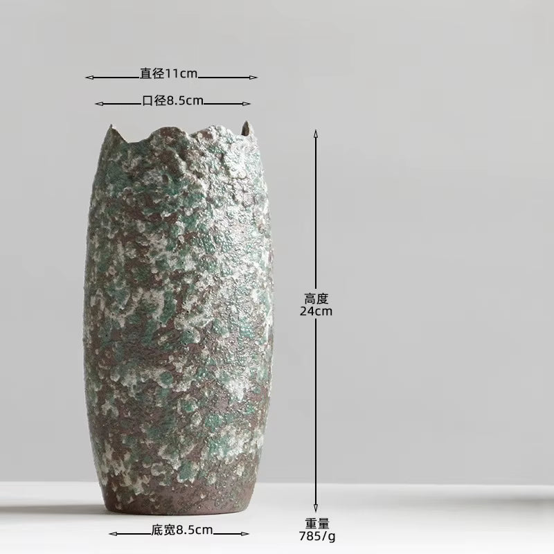 Decorative vase with measurement labels on a gray background