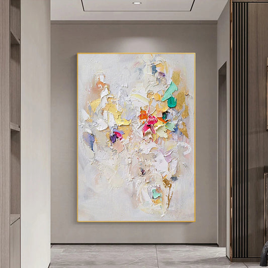 Abstract painting with colorful abstract design on a wall in a modern interior setting.