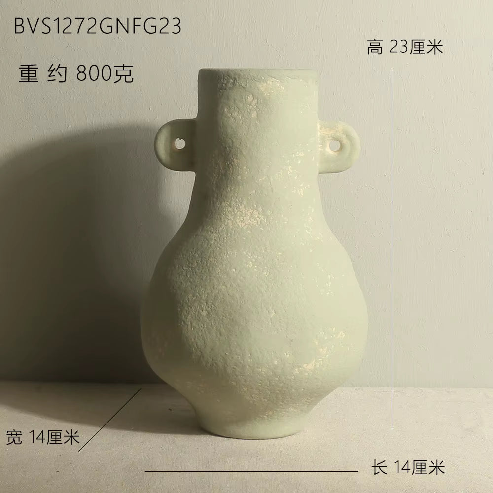 Textured ceramic vase on a light gray background with measurements displayed.
