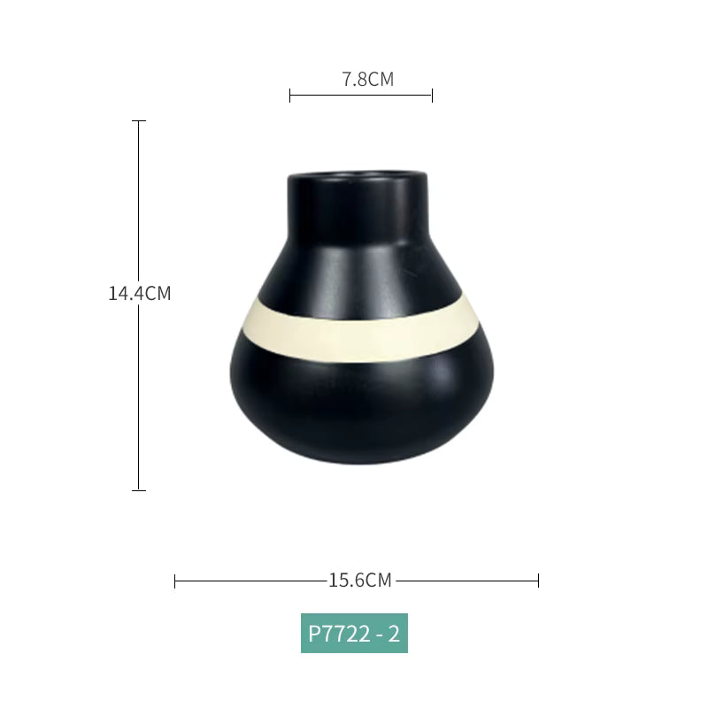 Black vase with a white band and measurements on a white background