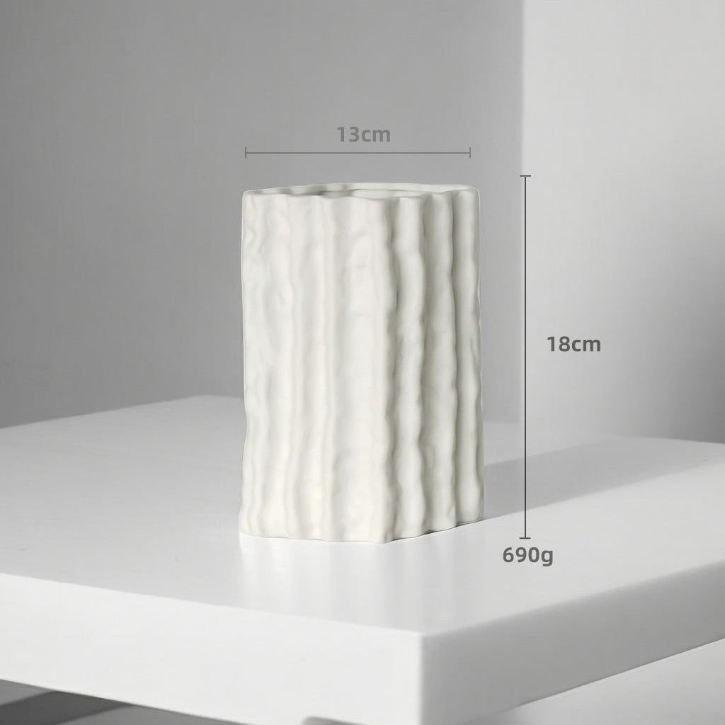 White textured vase on a gray background with measurements indicated.