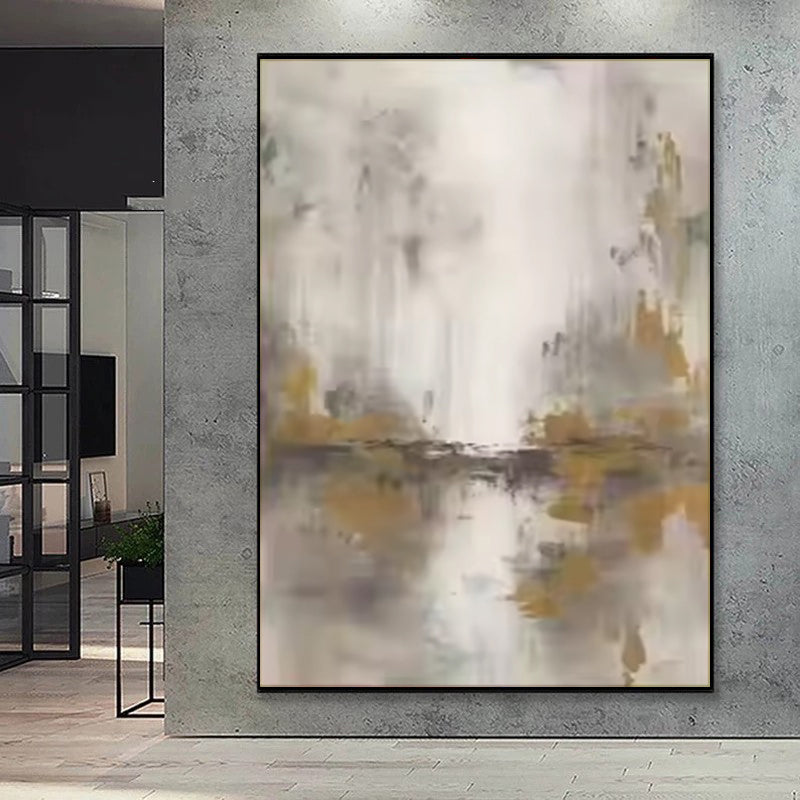 Abstract painting with earthy tones on a gray wall