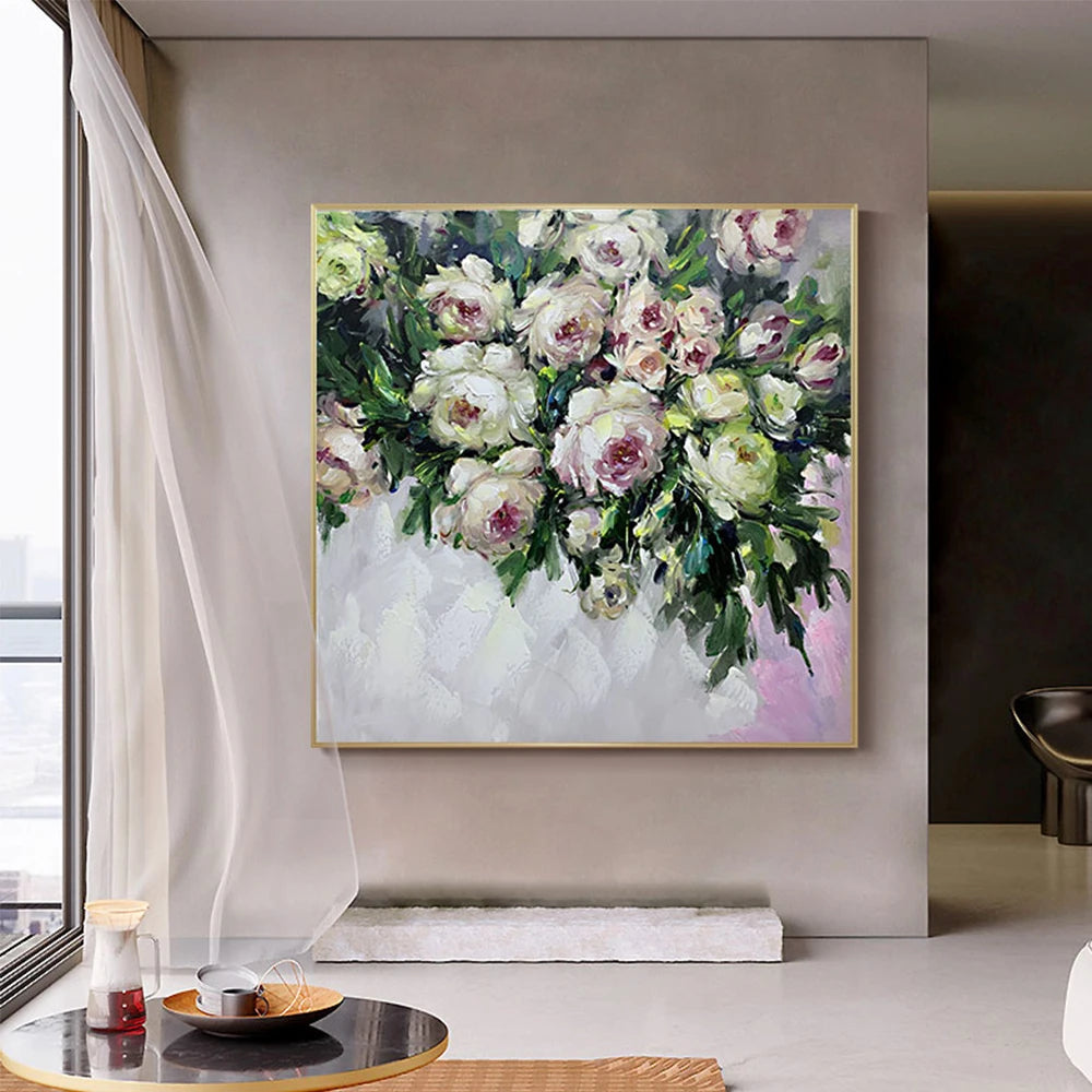 Framed floral painting on a wall in a modern interior setting