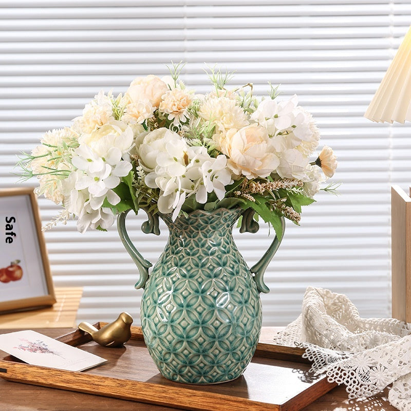 Decorative vase with flowers on a table