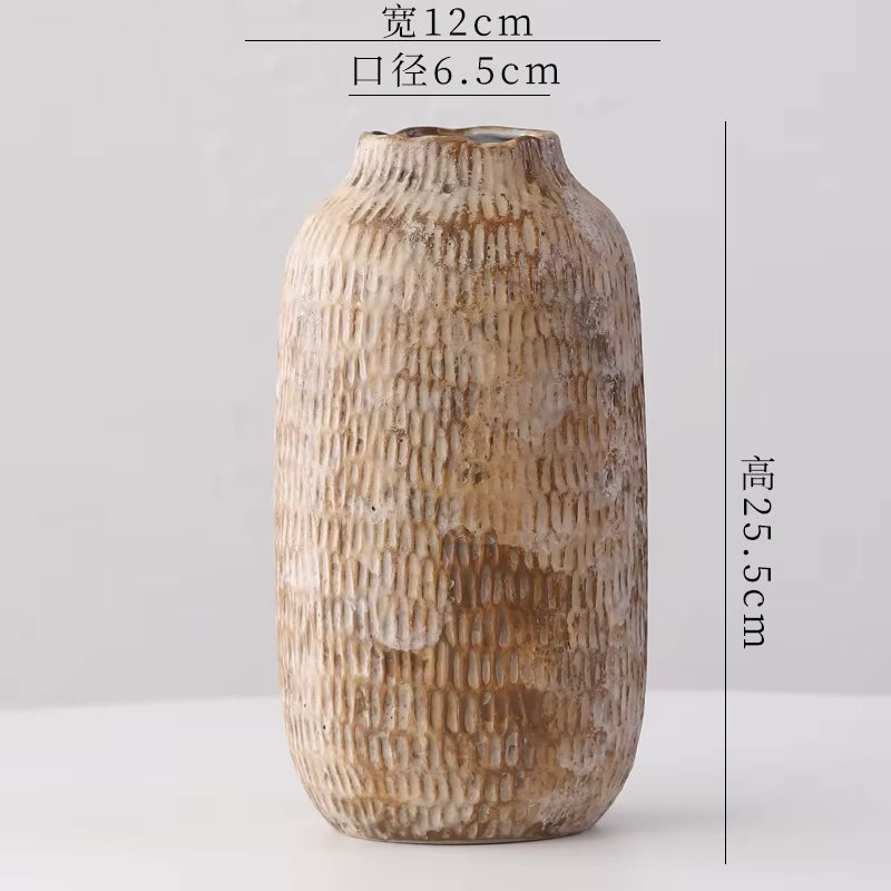 Textured ceramic vase with dimensions on a light gray background