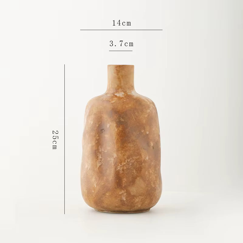 Brown ceramic vase with measurements on a white background
